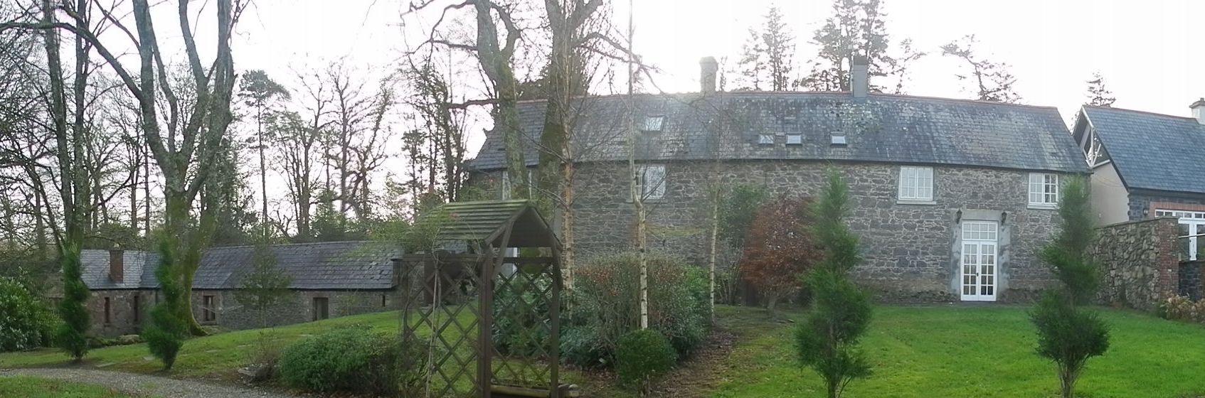 Rear view of(r to l) Lodge 1, Lodge 2 and Stables